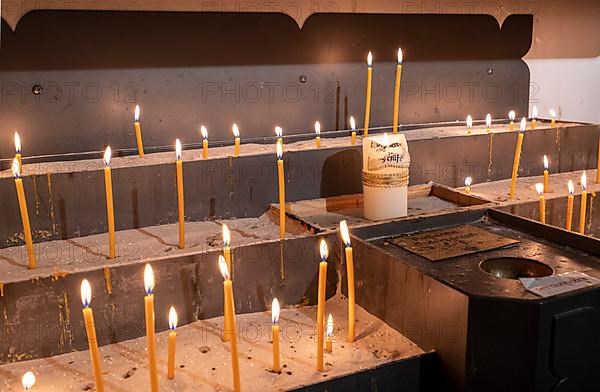 Candles in the collegiate parish church of St. Philip and St. James
