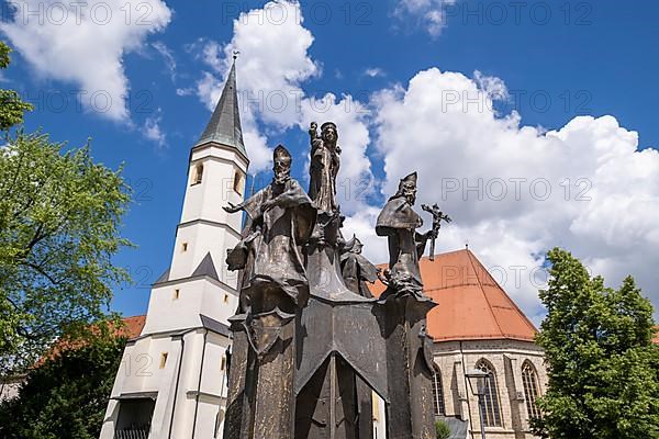 Fountain in front of the collegiate parish church of St. Philip and St. James in the pilgrimage town of Altoetting. The fountain was erected to mark the 1250th anniversary of the establishment of the four dioceses of Regensburg