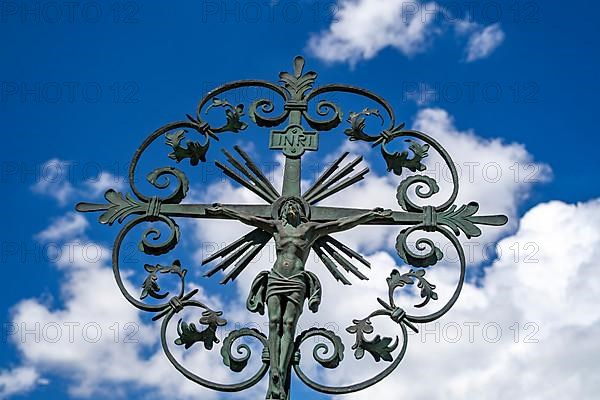 Ornate crucifix on a gravestone