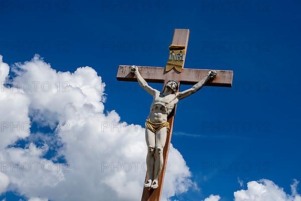 Crucifix on a gravestone at the St. Michael cemetery
