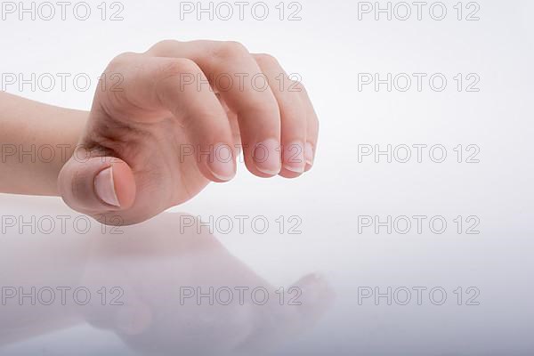 Hand holding on a white background