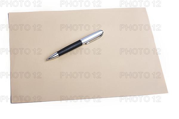 Pen and plain color paper on an isolated background