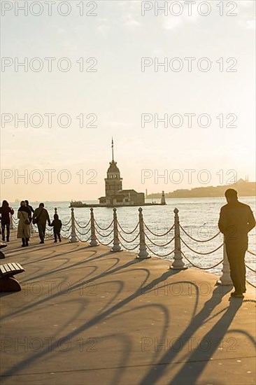 People towards Maidens Tower located in the middle of Bosporus