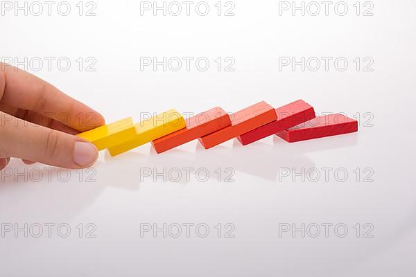 Colorful Domino Blocks in a line on a white background