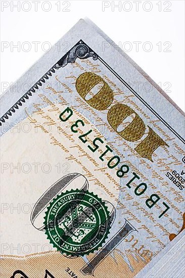 American 100 dollar banknotes made of paper placed on white background