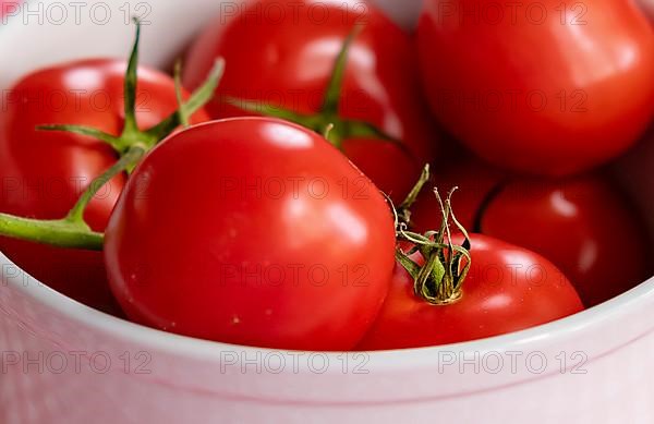 Close up of tomatoes in a corduroy