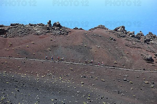 Hikers on the way from San Antonio Volcano to Teneguia Volcano at Cap Fuencaliente