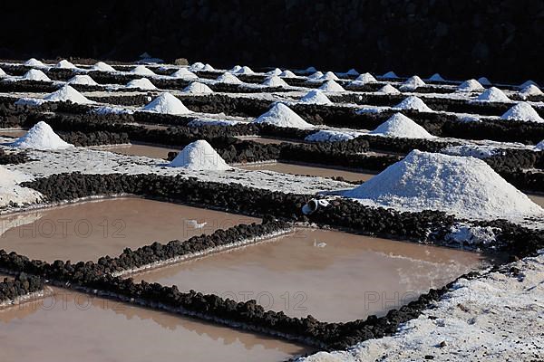 Crystal pools and salt mountains of the salt works in Fuencaliente at the Punta de Fuencaliente