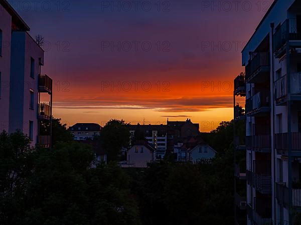 Sunset behind apartment blocks