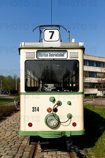 Historic tram in front of the head office of the transport company Vestische Strassenbahnen