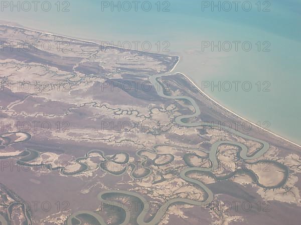 Landscape between Cairns and Darwin with many meandering streams and rivers, Australia -