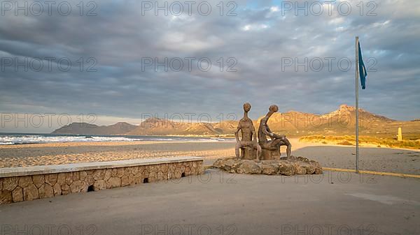 Beach promenade with sandy beach Playa Sa Canova in Son Serra de Marina, sculptures by Joan Bennassar