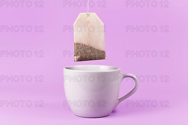 Tea bag and cup,