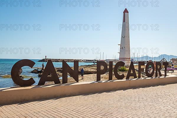 Beach promenade with Can Picafort lettering and obelisk, Can Picafort