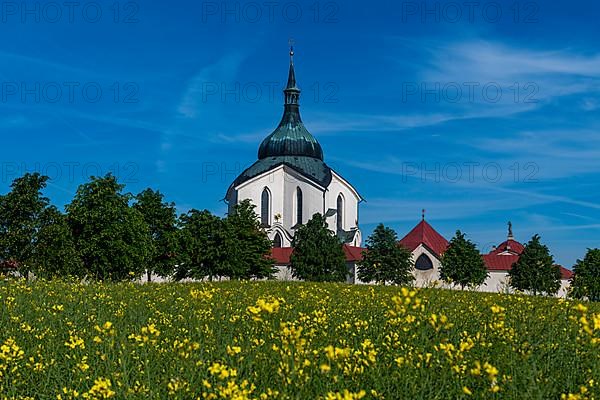 Flower field before the Unesco site Pilgrimage Church of Saint John of Nepomuk, Czech Republic