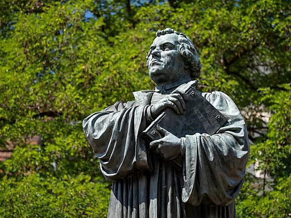 Luther monument by the sculptor Adolf von Donndorf from 1895 on Karlsplatz in Eisenach. The reformer Martin Luther,