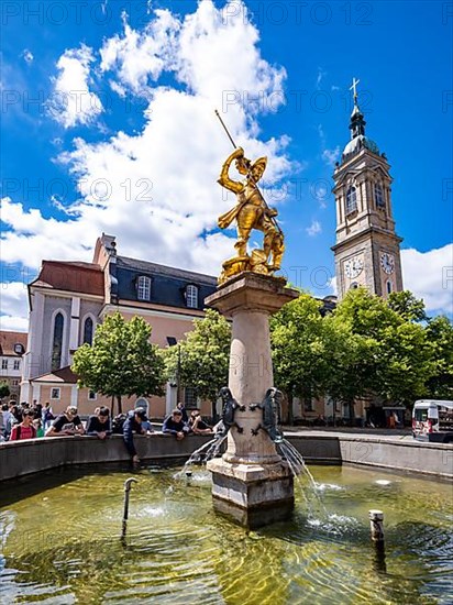 Sculpture of St. George with gilded armour as dragon slayer at St. George's Fountain in front of the Georgenkirche, Eisenach