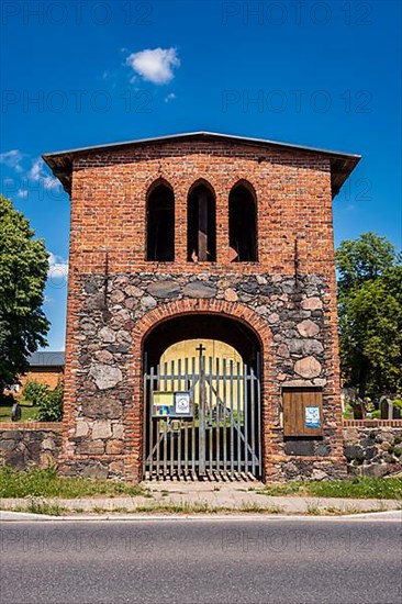 Bell tower in front of Lindenberg village church, Brandenburg