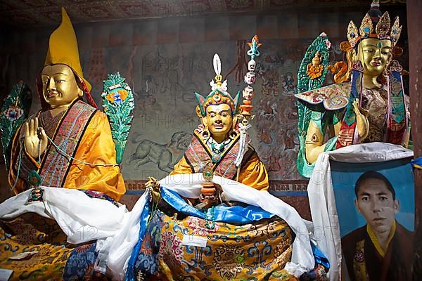 Buddhist lama statues with prayer shawls, Thiksey Monastery or Thikse Gompa