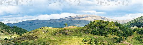 Panorama of Mountains in Lights and Shadows over Glenfinnan Viaduct, West Highland Line in Glenfinnan