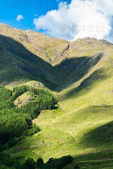 Mountains in Lights and Shadows over Glenfinnan Viaduct, West Highland Line in Glenfinnan