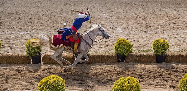 Ottoman archer riding and shooting on horseback,