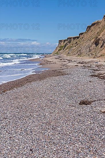 Shingle beach, steep coast