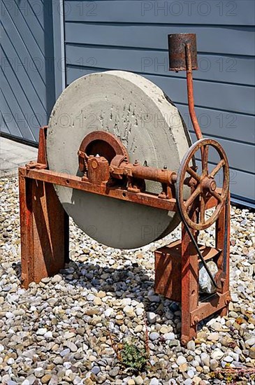 Old grindstone with rusted mechanics, Buchenberg