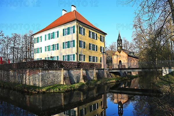 Historic Sisi Castle in Unterwittelsbach near Aichach with moat. Unterwittelsbach, Aichach