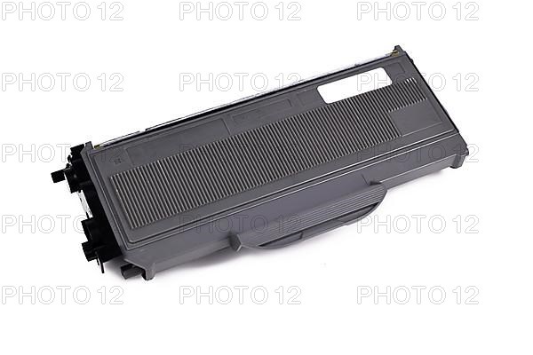 Used laser printer toner cartridge on white background,