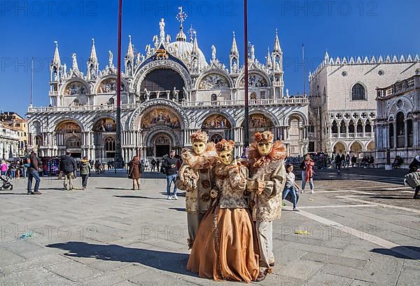 St. Mark's Square with Carnival Masks in front of St. Mark's Basilica, Venice