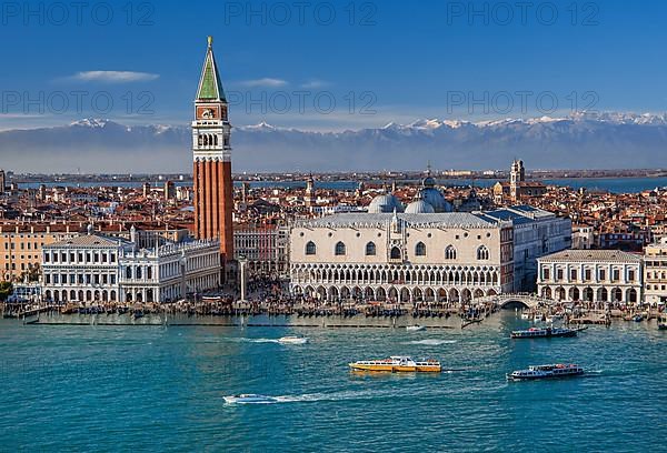Waterfront on the lagoon with Piazzetta, Campanile and Doge's Palace in front of the Alpine chain