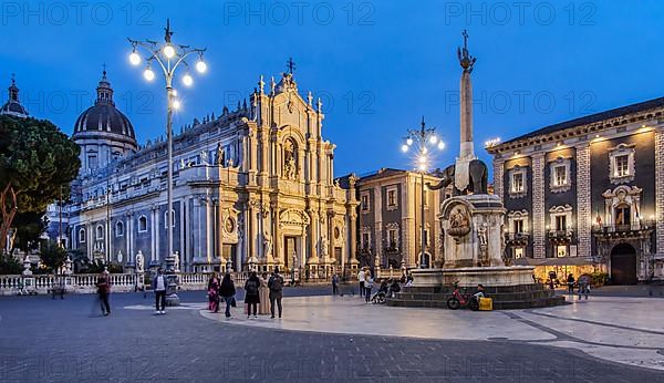 Cathedral square with cathedral and elephant fountain in the old town at dusk, Catania