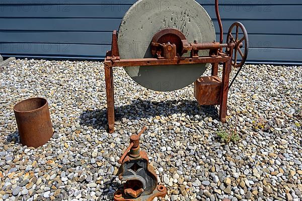 Old grindstone with rusted mechanics, Buchenberg