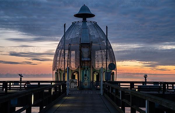 Diving gondola of the pier Sellin in the sunrise on the island of Ruegen, Germany
