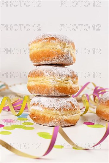 Berliner Pfannkuchen, a traditional German donut like dessert filled with jam made from sweet yeast dough fried in fat. Traditional served during carnival