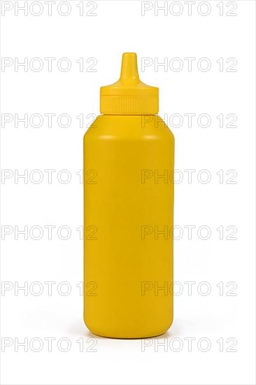 Yellow mustard squeeze bottle isolated on white background,