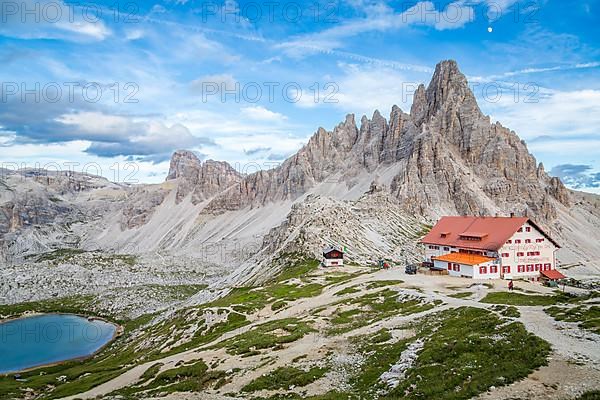 View of mountain hut Dreizinnenhuette with rock massif Paternkofel, Dolomites