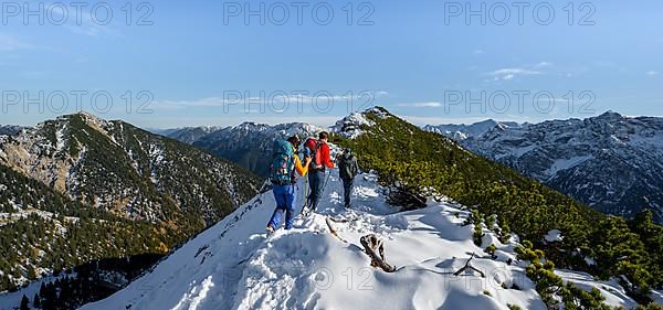 Hikers on a ridge in autumn with snow, hiking trail to Weitalpspitz