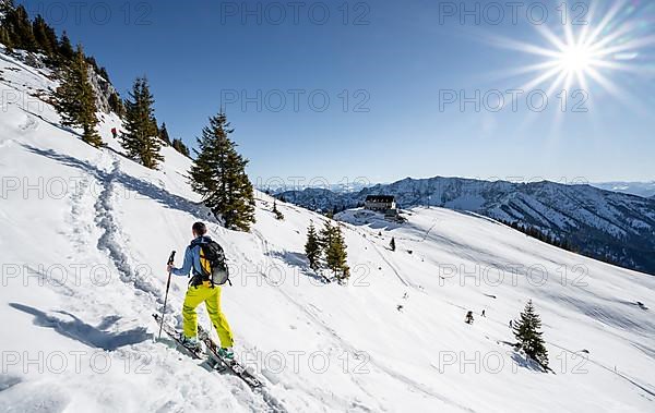 Ski tourers on a ski tour on the Rotwand, behind mountain hut Rotwandhaus