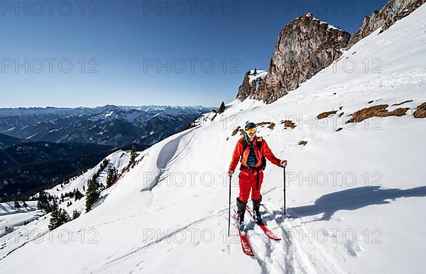 Ski tourers on a ski tour on the Rotwand, in winter