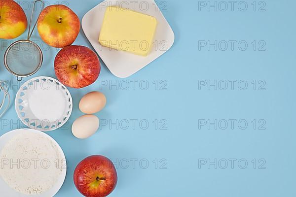 Apple pie baking ingredients with butter, flour