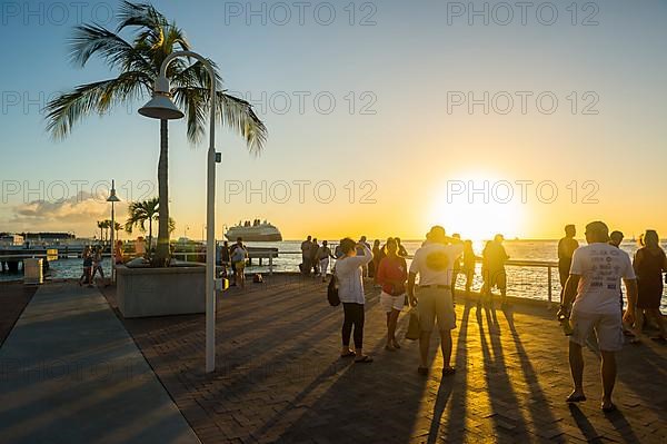 Tourists in backlight at the Seafront of Key West, Florida