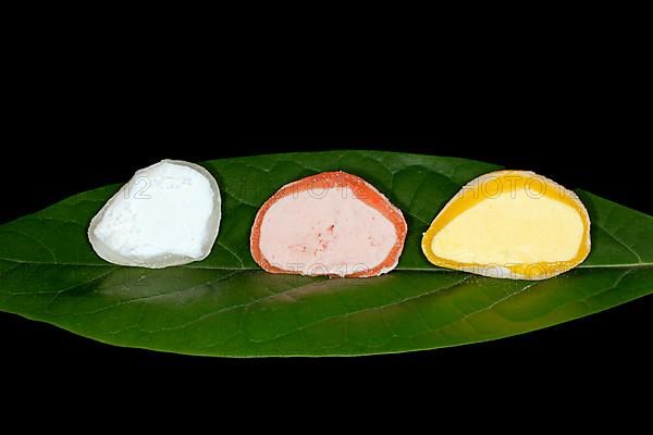 Japanese mochi ice cream filled with yuzu, mango and strawberry