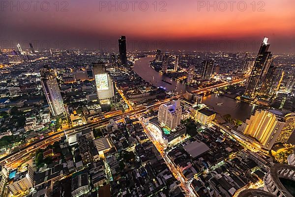 Nightshot from Bangkok and the Chao Phraya River with the dome of Lebua tower, Bangkok