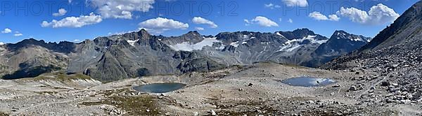 Mountain lakes in scree, behind Val Grialetsch with Piz Sarsura and Piz Vadret