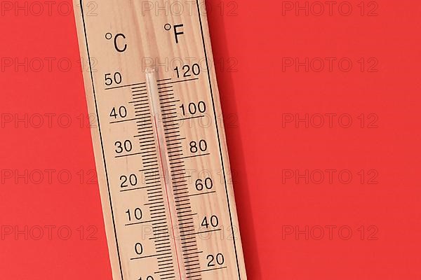 Thermometer showing 40 degrees Celsius or 104 degrees Fahrenheit during summer heat wave,