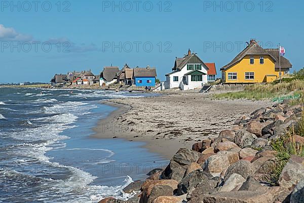 Thatched roof houses on the beach, Graswarder peninsula