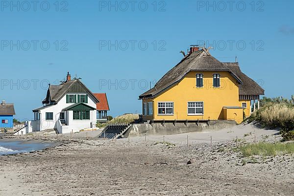 Thatched roof houses on the beach, Graswarder peninsula