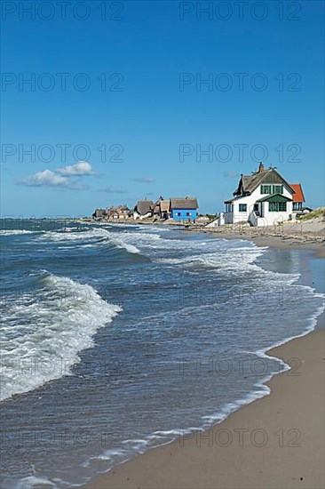 Thatched roof houses on the beach, Graswarder peninsula